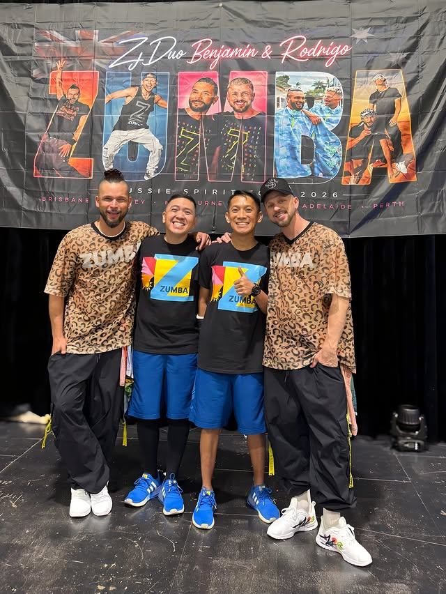 The UR Fitness DJ instructors standing with the visiting masterclass presenters.