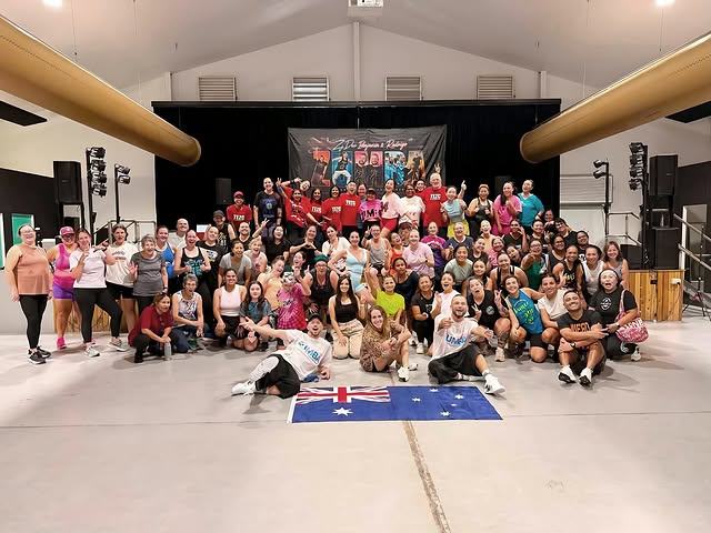 A large group photo from a masterclass with visiting presenters.